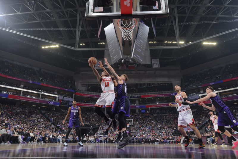 SACRAMENTO, CA - MARCH 4: DeMar DeRozan #11 of the Chicago Bulls drives to the basket during the game against the Sacramento Kings on March 4, 2024 at Golden 1 Center in Sacramento, California. NOTE TO USER: User expressly acknowledges and agrees that, by downloading and or using this Photograph, user is consenting to the terms and conditions of the Getty Images License Agreement. Mandatory Copyright Notice: Copyright 2024 NBAE (Photo by Rocky Widner/NBAE via Getty Images)