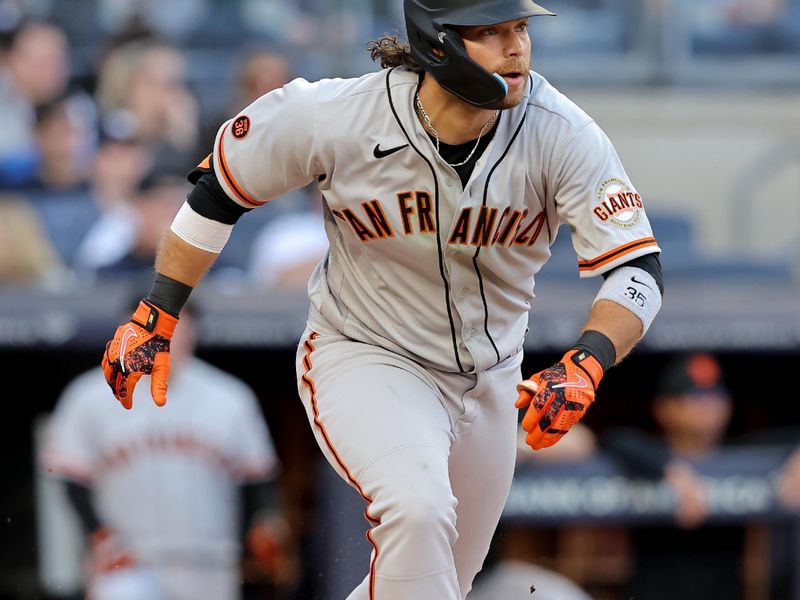 Apr 1, 2023; Bronx, New York, USA; San Francisco Giants shortstop Brandon Crawford (35) runs out a double against the New York Yankees during the sixth inning at Yankee Stadium. Mandatory Credit: Brad Penner-USA TODAY Sports