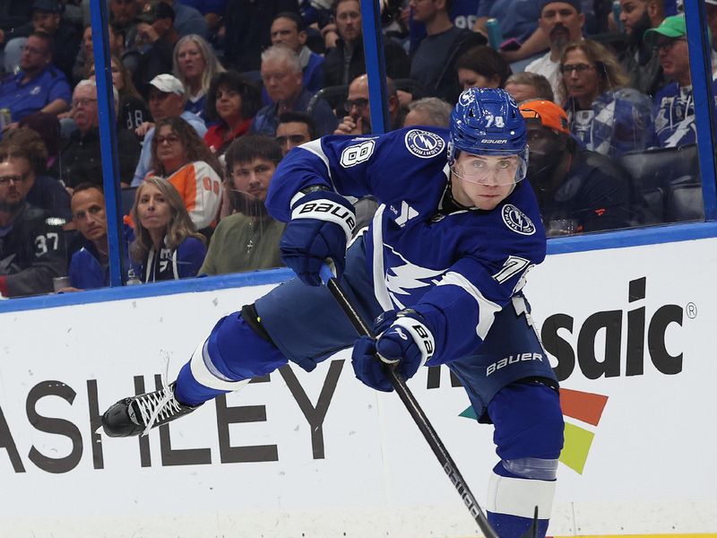 Nov 7, 2024; Tampa, Florida, USA; Tampa Bay Lightning defenseman Emil Lilleberg (78) passes the puck against the Philadelphia Flyers during the second period at Amalie Arena. Mandatory Credit: Kim Klement Neitzel-Imagn Images