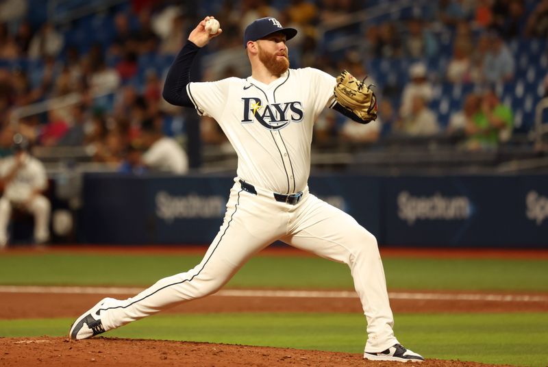 Apr 22, 2024; St. Petersburg, Florida, USA; Tampa Bay Rays pitcher Zack Littell (52) throws a pitch during the sixth inning against the Detroit Tigers at Tropicana Field. Mandatory Credit: Kim Klement Neitzel-USA TODAY Sports