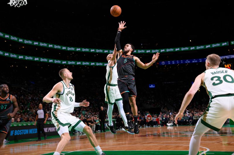 BOSTON, MA - FEBRUARY 9: Tyus Jones #5 of the Washington Wizards drives to the basket during the game against the Boston Celtics on February 9, 2024 at the TD Garden in Boston, Massachusetts. NOTE TO USER: User expressly acknowledges and agrees that, by downloading and or using this photograph, User is consenting to the terms and conditions of the Getty Images License Agreement. Mandatory Copyright Notice: Copyright 2024 NBAE  (Photo by Brian Babineau/NBAE via Getty Images)