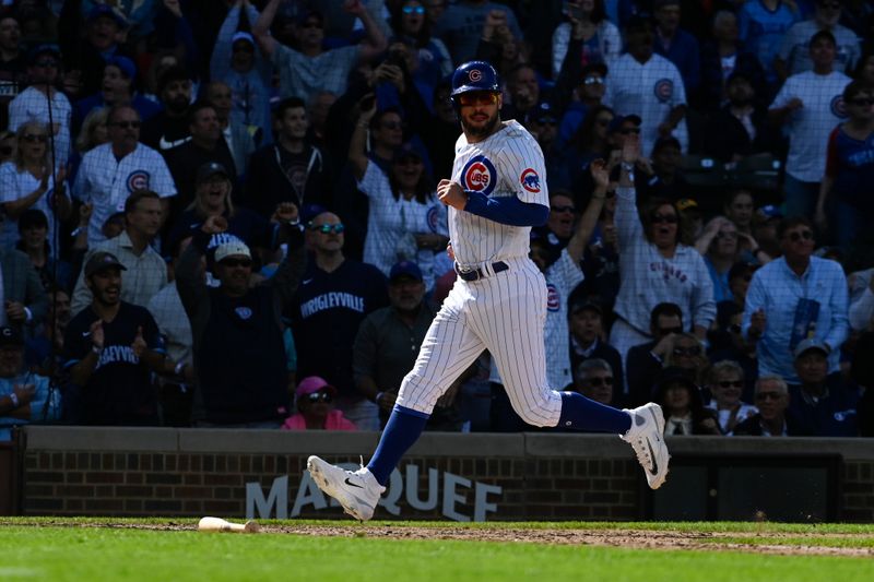 Aug 30, 2023; Chicago, Illinois, USA;  Chicago Cubs center fielder Mike Tauchman (40) scores against the Milwaukee Brewers during the eighth inning at Wrigley Field. Mandatory Credit: Matt Marton-USA TODAY Sports