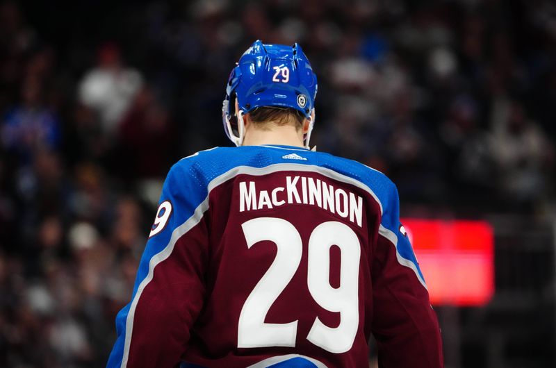 Dec 13, 2023; Denver, Colorado, USA; Colorado Avalanche center Nathan MacKinnon (29) during a break in the second period against the Buffalo Sabres at Ball Arena. Mandatory Credit: Ron Chenoy-USA TODAY Sports