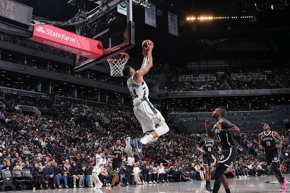 BROOKLYN, NY - DECEMBER 27: Giannis Antetokounmpo #34 of the Milwaukee Bucks dunks the ball during the game against the Brooklyn Nets on December 27, 2023 at Barclays Center in Brooklyn, New York. NOTE TO USER: User expressly acknowledges and agrees that, by downloading and or using this Photograph, user is consenting to the terms and conditions of the Getty Images License Agreement. Mandatory Copyright Notice: Copyright 2023 NBAE (Photo by Jesse D. Garrabrant/NBAE via Getty Images)