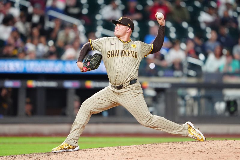 Jun 14, 2024; New York City, New York, USA; San Diego Padres pitcher Adrian Morejon (50) delivers a pitch against the New York Mets during the eighth inning at Citi Field. Mandatory Credit: Gregory Fisher-USA TODAY Sports