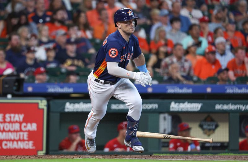 Jun 18, 2023; Houston, Texas, USA; Houston Astros third baseman Alex Bregman (2) hits a double during the first inning against the Cincinnati Reds at Minute Maid Park. Mandatory Credit: Troy Taormina-USA TODAY Sports