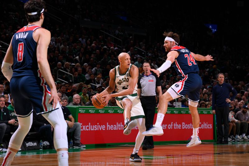 BOSTON, MA - APRIL 14: Jordan Walsh #27 of the Boston Celtics looks to pass the ball during the game  against the Washington Wizards on April 14, 2024 at the TD Garden in Boston, Massachusetts. NOTE TO USER: User expressly acknowledges and agrees that, by downloading and or using this photograph, User is consenting to the terms and conditions of the Getty Images License Agreement. Mandatory Copyright Notice: Copyright 2024 NBAE  (Photo by Brian Babineau/NBAE via Getty Images)