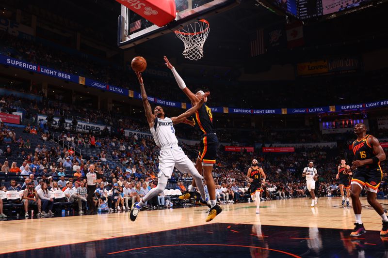 OKLAHOMA CITY, OK - APRIL 14: AJ Lawson #9 of the Dallas Mavericks shoots the ball during the game against the Oklahoma City Thunder on April 14, 2024 at Paycom Arena in Oklahoma City, Oklahoma. NOTE TO USER: User expressly acknowledges and agrees that, by downloading and or using this photograph, User is consenting to the terms and conditions of the Getty Images License Agreement. Mandatory Copyright Notice: Copyright 2024 NBAE (Photo by Zach Beeker/NBAE via Getty Images)