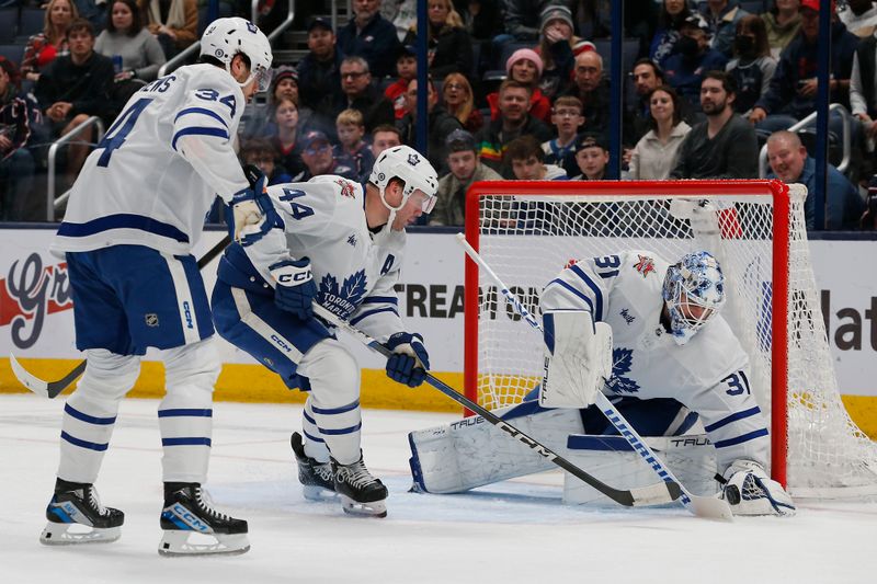 Dec 23, 2023; Columbus, Ohio, USA; Toronto Maple Leafs goalie Martin Jones (31) makes a stick save against the Columbus Blue Jackets during the first period at Nationwide Arena. Mandatory Credit: Russell LaBounty-USA TODAY Sports