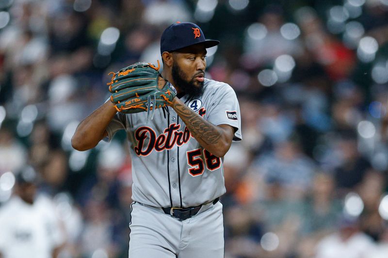 Jun 2, 2025; Chicago, Illinois, USA; Detroit Tigers relief pitcher Dylan Smith (58) delivers a pitch against the Chicago White Sox during the seventh inning at Rate Field. Mandatory Credit: Kamil Krzaczynski-Imagn Images