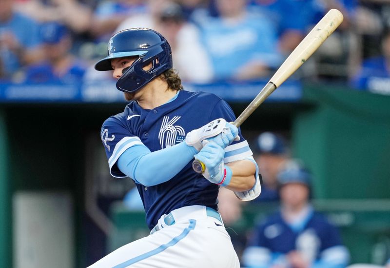 May 26, 2023; Kansas City, Missouri, USA; Kansas City Royals shortstop Bobby Witt Jr. (7) hits a double during the fourth inning against the Washington Nationals at Kauffman Stadium. Mandatory Credit: Jay Biggerstaff-USA TODAY Sports