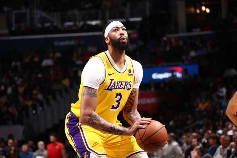 WASHINGTON, DC -? APRIL 4: Anthony Davis #3 of the Los Angeles Lakers prepares to shoot a free throw during the game against the Washington Wizards on April 4, 2024 at Capital One Arena in Washington, DC. NOTE TO USER: User expressly acknowledges and agrees that, by downloading and or using this Photograph, user is consenting to the terms and conditions of the Getty Images License Agreement. Mandatory Copyright Notice: Copyright 2024 NBAE (Photo by Kenny Giarla/NBAE via Getty Images)