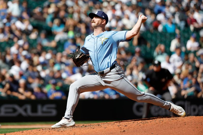 Aug 28, 2024; Seattle, Washington, USA; Tampa Bay Rays relief pitcher Manuel Rodriguez (39) throws against the Seattle Mariners during the fifth inning at T-Mobile Park. Mandatory Credit: Joe Nicholson-USA TODAY Sports