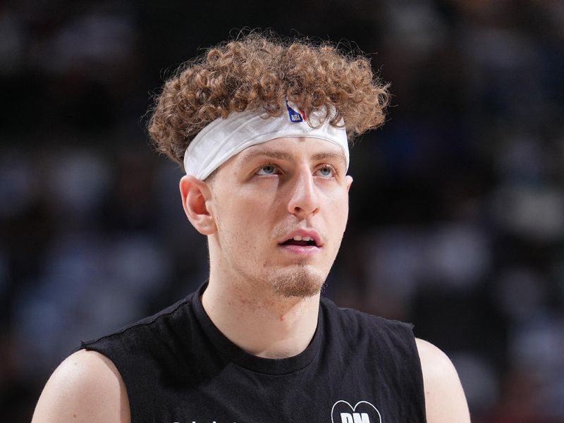 DALLAS, TX - APRIL 5: Brandin Podziemski #2 of the Golden State Warriors warms up before the game against the Dallas Mavericks on April 5, 2024 at the American Airlines Center in Dallas, Texas. NOTE TO USER: User expressly acknowledges and agrees that, by downloading and or using this photograph, User is consenting to the terms and conditions of the Getty Images License Agreement. Mandatory Copyright Notice: Copyright 2024 NBAE (Photo by Glenn James/NBAE via Getty Images)