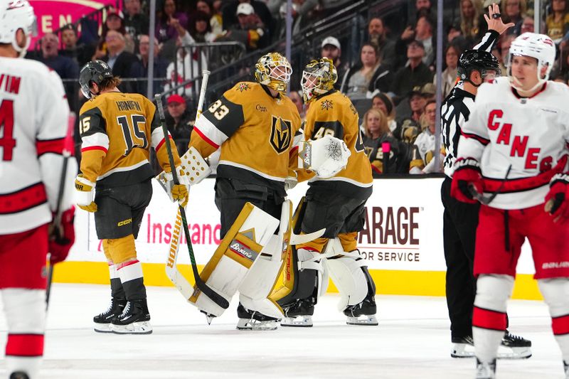 Nov 11, 2024; Las Vegas, Nevada, USA; Vegas Golden Knights goaltender Akira Schmid (40) replaces Vegas Golden Knights goaltender Adin Hill (33) during the second period against the Carolina Hurricanes at T-Mobile Arena. Mandatory Credit: Stephen R. Sylvanie-Imagn Images