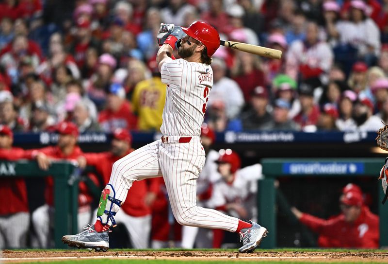 May 5, 2024; Philadelphia, Pennsylvania, USA; Philadelphia Phillies first baseman Bryce Harper (3) hits a three-run home run against the San Francisco Giants in the third inning at Citizens Bank Park. Mandatory Credit: Kyle Ross-USA TODAY Sports