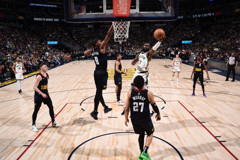 DENVER, CO - MARCH 7: Jaylen Brown #7 of the Boston Celtics drives to the basket during the game against the Denver Nuggets on March 7, 2024 at the Ball Arena in Denver, Colorado. NOTE TO USER: User expressly acknowledges and agrees that, by downloading and/or using this Photograph, user is consenting to the terms and conditions of the Getty Images License Agreement. Mandatory Copyright Notice: Copyright 2024 NBAE (Photo by Garrett Ellwood/NBAE via Getty Images)