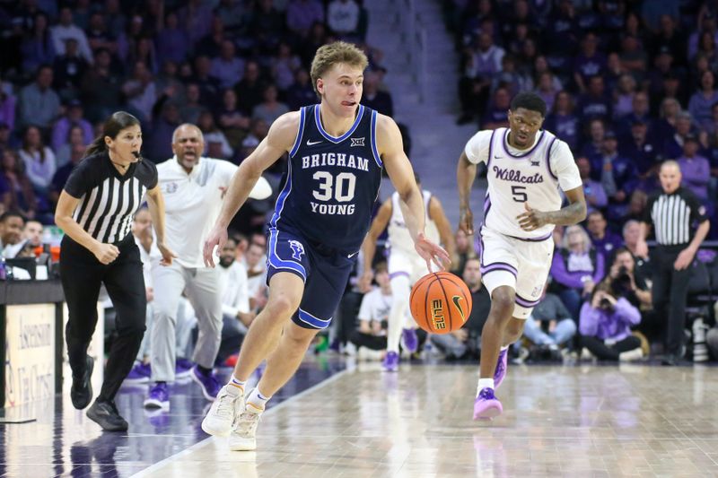 Feb 24, 2024; Manhattan, Kansas, USA; Brigham Young Cougars guard Dallin Hall (30) brings the ball up court during the second half against the Kansas State Wildcats at Bramlage Coliseum. Mandatory Credit: Scott Sewell-USA TODAY Sports