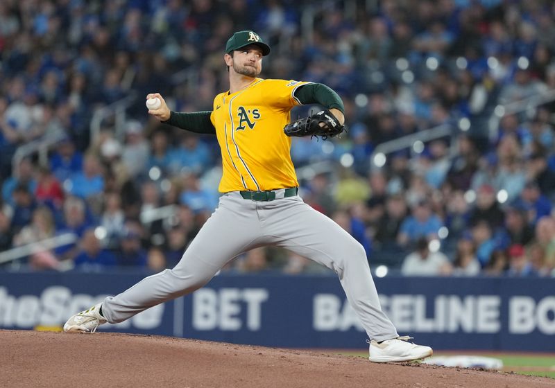 May 31, 2025; Toronto, Ontario, CAN; Athletics starting pitcher Gunnar Hoglund (53) throws a pitch against the Toronto Blue Jays during the first inning at Rogers Centre. Mandatory Credit: Nick Turchiaro-Imagn Images