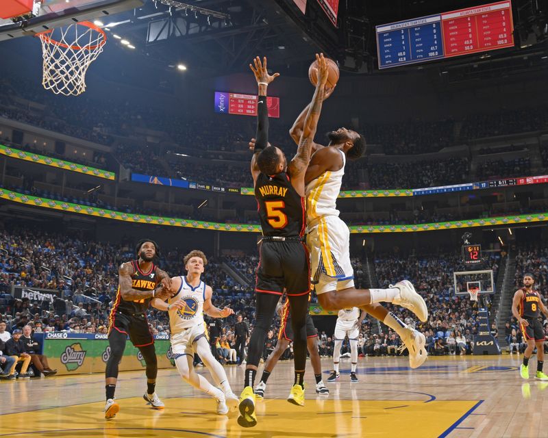 SAN FRANCISCO, CA - JANUARY 24: Andrew Wiggins #22 of the Golden State Warriors drives to the basket during the game against the Atlanta Hawks on January 24, 2024 at Chase Center in San Francisco, California. NOTE TO USER: User expressly acknowledges and agrees that, by downloading and or using this photograph, user is consenting to the terms and conditions of Getty Images License Agreement. Mandatory Copyright Notice: Copyright 2024 NBAE (Photo by Noah Graham/NBAE via Getty Images)