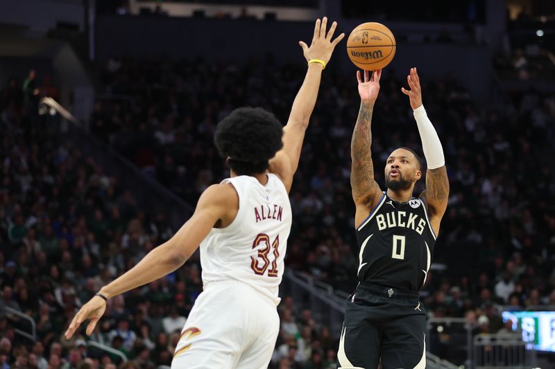 MILWAUKEE, WISCONSIN - JANUARY 26: Damian Lillard #0 of the Milwaukee Bucks is defended by Jarrett Allen #31 of the Cleveland Cavaliers during a game at Fiserv Forum on January 26, 2024 in Milwaukee, Wisconsin. NOTE TO USER: User expressly acknowledges and agrees that, by downloading and or using this photograph, User is consenting to the terms and conditions of the Getty Images License Agreement. (Photo by Stacy Revere/Getty Images)