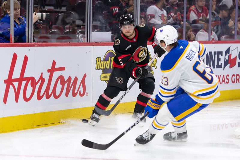 Sep 26, 2024; Ottawa, Ontario, CAN; Ottawa Senators defenseman Calen Addison (6) moves the puck past Buffalo Sabres right wing Isak Rosen (63) in the second period at the Canadian Tire Centre. Mandatory Credit: Marc DesRosiers-Imagn Images