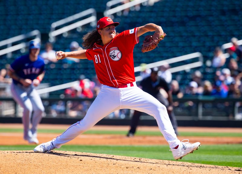 Mar 20, 2024; Goodyear, Arizona, USA; Cincinnati Reds pitcher Rhett Lowder against the Texas Rangers during a spring training baseball game at Goodyear Ballpark. Mandatory Credit: Mark J. Rebilas-USA TODAY Sports