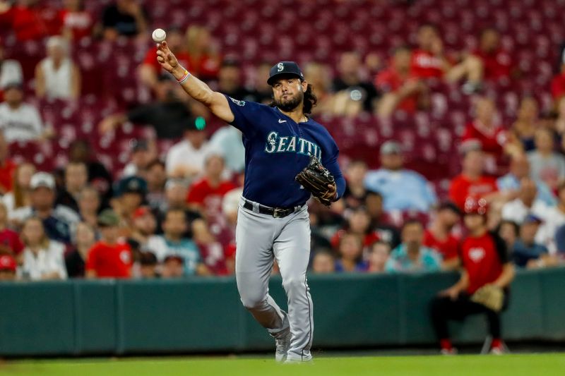 Sep 5, 2023; Cincinnati, Ohio, USA; Seattle Mariners third baseman Eugenio Suarez (28) throws to first to get Cincinnati Reds second baseman Spencer Steer (not pictured) out in the eighth inning at Great American Ball Park. Mandatory Credit: Katie Stratman-USA TODAY Sports