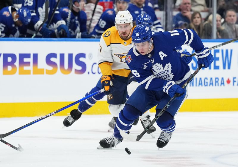 Dec 9, 2023; Toronto, Ontario, CAN; Toronto Maple Leafs right wing Mitchell Marner (16) skates with the puck as Nashville Predators defenseman Ryan McDonagh (27) gives chase during the third period at Scotiabank Arena. Mandatory Credit: Nick Turchiaro-USA TODAY Sports