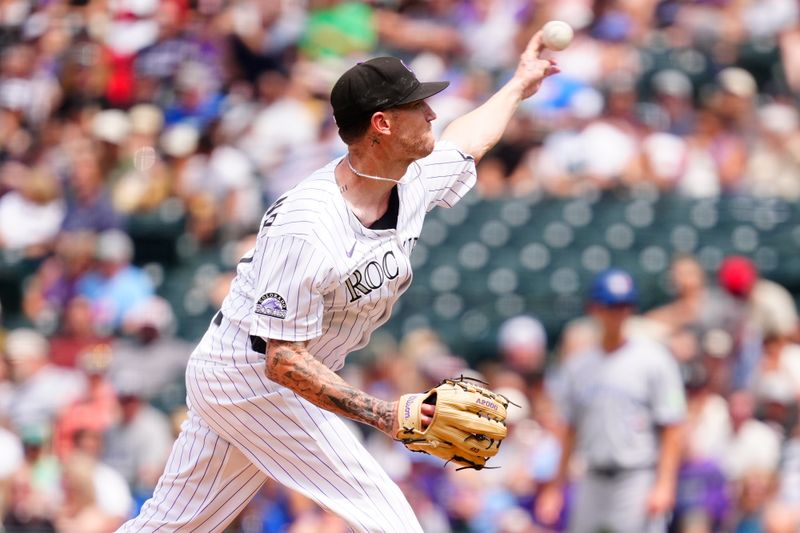 Aug 6, 2025; Denver, Colorado, USA; Colorado Rockies staring pitcher Kyle Freeland (21) delivers a pitch in the fourth inning against the Toronto Blue Jays at Coors Field. Mandatory Credit: Ron Chenoy-Imagn Images