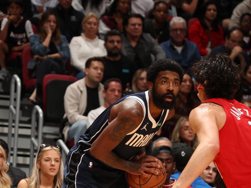 MIAMI, FL - NOVEMBER 24: Kyrie Irving #11 of the Dallas Mavericks dribbles the ball during the game against the Miami Heat on November 24, 2024 at Kaseya Center in Miami, Florida. NOTE TO USER: User expressly acknowledges and agrees that, by downloading and or using this Photograph, user is consenting to the terms and conditions of the Getty Images License Agreement. Mandatory Copyright Notice: Copyright 2024 NBAE (Photo by Issac Baldizon/NBAE via Getty Images)