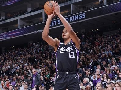 SACRAMENTO, CA - DECEMBER 20:  Keegan Murray #13 of the Sacramento Kings shoots a three point basket during the game  on December 20, 2023 at Golden 1 Center in Sacramento, California. NOTE TO USER: User expressly acknowledges and agrees that, by downloading and or using this Photograph, user is consenting to the terms and conditions of the Getty Images License Agreement. Mandatory Copyright Notice: Copyright 2023 NBAE (Photo by Rocky Widner/NBAE via Getty Images)