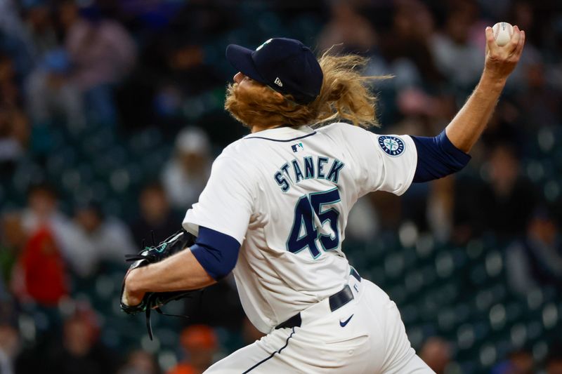 May 28, 2024; Seattle, Washington, USA; Seattle Mariners relief pitcher Ryne Stanek (45) throws against the Houston Astros during the ninth inning at T-Mobile Park. Mandatory Credit: Joe Nicholson-USA TODAY Sports