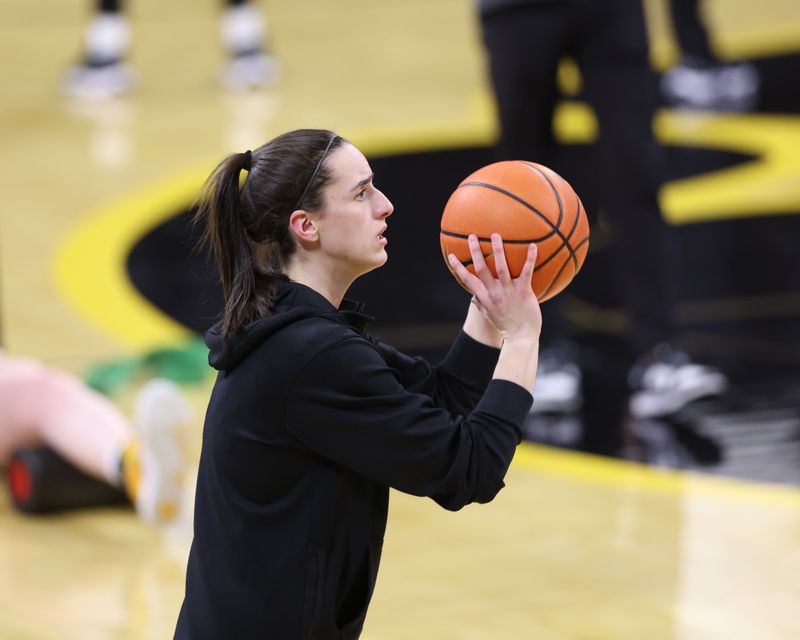 Feb 15, 2024; Iowa City, Iowa, USA; Iowa Hawkeyes guard Caitlin Clark (22) warms up before her game with the Michigan Wolverines at Carver-Hawkeye Arena. Mandatory Credit: Reese Strickland-USA TODAY Sports
