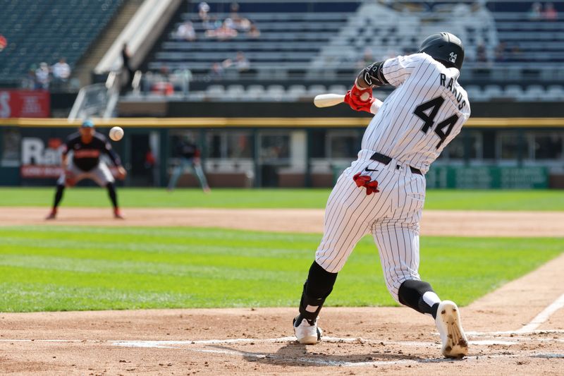 Sep 11, 2024; Chicago, Illinois, USA; Chicago White Sox third baseman Bryan Ramos (44) singles against the Cleveland Guardians during the first inning at Guaranteed Rate Field. Mandatory Credit: Kamil Krzaczynski-Imagn Images