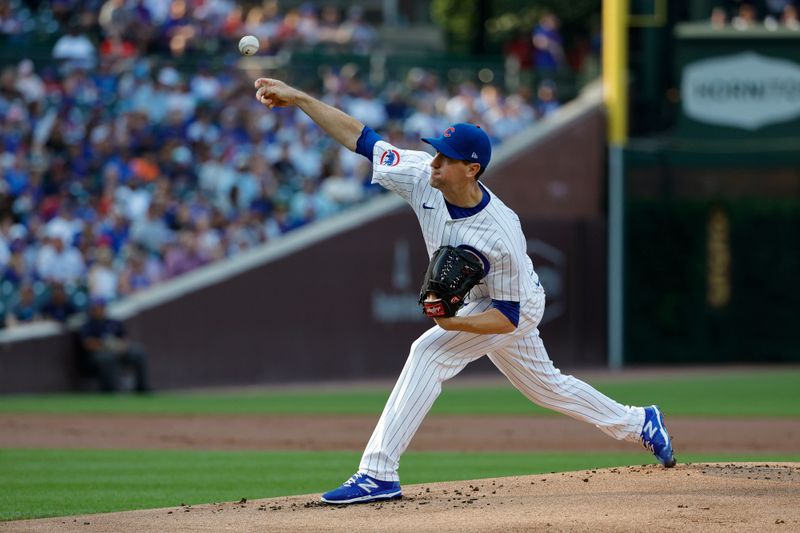 Jul 20, 2024; Chicago, Illinois, USA; Chicago Cubs starting pitcher Kyle Hendricks (28) delivers against the Arizona Diamondbacks during the first inning at Wrigley Field. Mandatory Credit: Kamil Krzaczynski-USA TODAY Sports