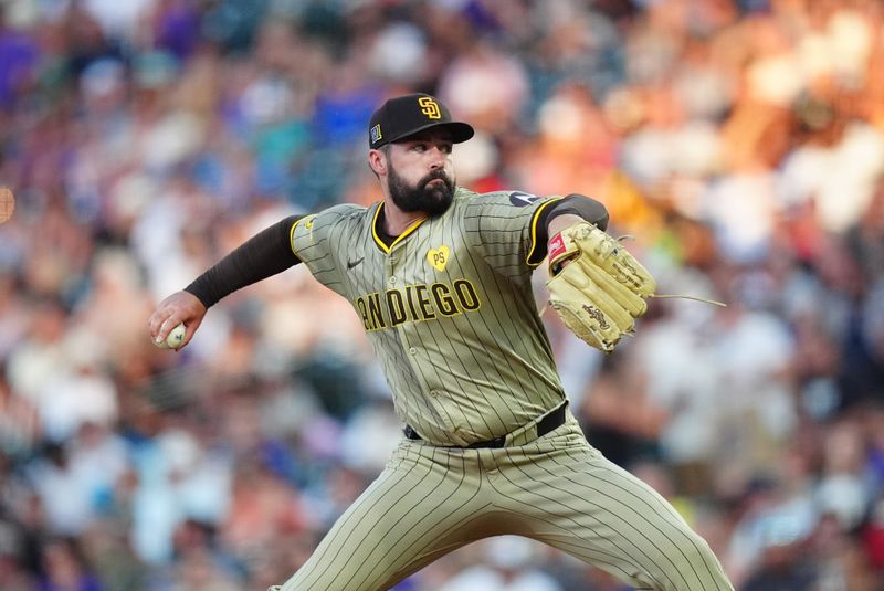 Aug 16, 2024; Denver, Colorado, USA; San Diego Padres starting pitcher Matt Waldron (61) delivers a pitch in the fourth inning against the Colorado Rockies at Coors Field. Mandatory Credit: Ron Chenoy-USA TODAY Sports