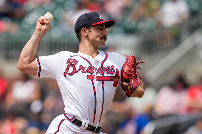 Jul 20, 2023; Cumberland, Georgia, USA; Atlanta Braves starting pitcher Spencer Strider (99) pitches against the Arizona Diamondbacks during the first inning at Truist Park. Mandatory Credit: Dale Zanine-USA TODAY Sports