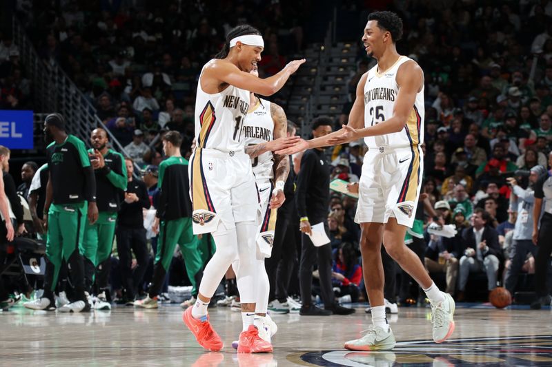 NEW ORLEANS, LA - JANUARY 31: Brandon Boston Jr. #11 and Trey Murphy III #25 of the New Orleans Pelicans high five during the game against the Boston Celtics on January 31, 2025 at the Smoothie King Center in New Orleans, Louisiana. NOTE TO USER: User expressly acknowledges and agrees that, by downloading and or using this Photograph, user is consenting to the terms and conditions of the Getty Images License Agreement. Mandatory Copyright Notice: Copyright 2025 NBAE (Photo by Layne Murdoch Jr./NBAE via Getty Images)