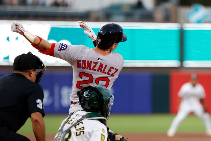 Sep 9, 2025; West Sacramento, California, USA; Boston Red Sox first baseman Romy Gonzalez (23) hits a solo home run during the first inning against the Athletics at Sutter Health Park. Mandatory Credit: Sergio Estrada-Imagn Images