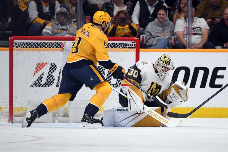 Mar 26, 2024; Nashville, Tennessee, USA; Vegas Golden Knights goaltender Jiri Patera (30) makes a save during the second period against the Nashville Predators at Bridgestone Arena. Mandatory Credit: Christopher Hanewinckel-USA TODAY Sports