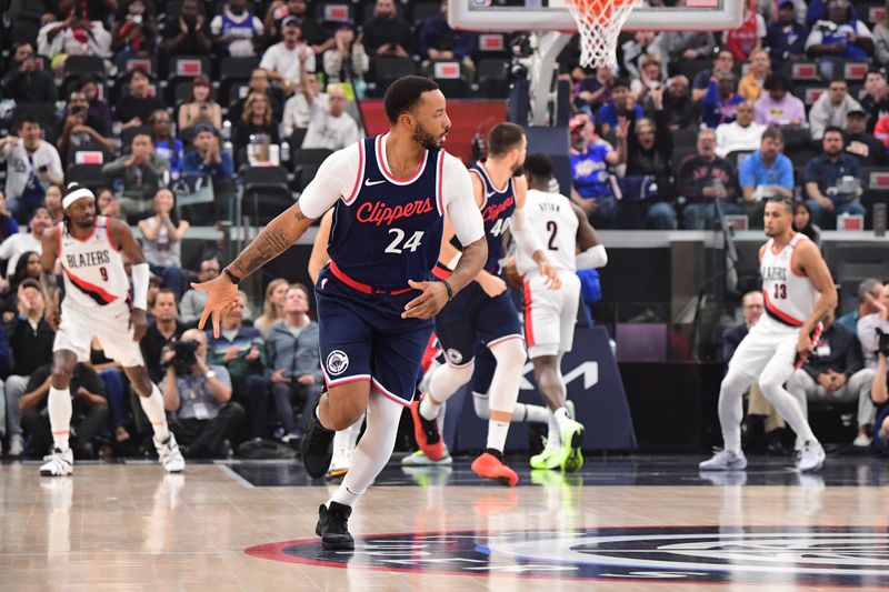 INGLEWOOD, CA - OCTOBER 30: Norman Powell #24 of the LA Clippers celebrates during the game against the Portland Trail Blazers on October 30, 2024 at Intuit Dome in Los Angeles, California. NOTE TO USER: User expressly acknowledges and agrees that, by downloading and/or using this Photograph, user is consenting to the terms and conditions of the Getty Images License Agreement. Mandatory Copyright Notice: Copyright 2024 NBAE (Photo by Adam Pantozzi/NBAE via Getty Images)