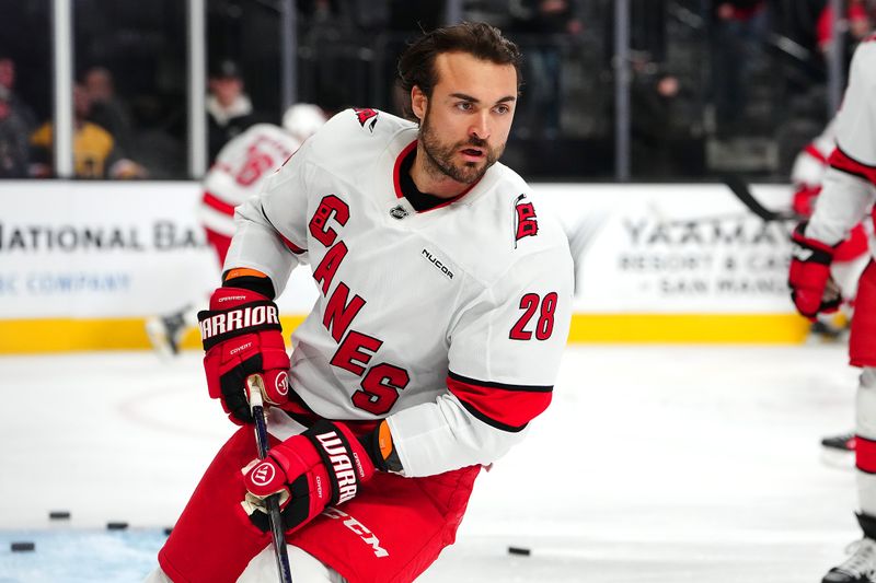 Nov 11, 2024; Las Vegas, Nevada, USA; Carolina Hurricanes left wing William Carrier (28) warms up before a game against the Vegas Golden Knights at T-Mobile Arena. Mandatory Credit: Stephen R. Sylvanie-Imagn Images