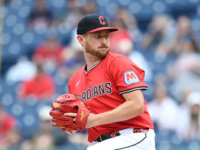 Jun 8, 2025; Cleveland, Ohio, USA; Cleveland Guardians starting pitcher Tanner Bibee (28) throws a pitch during the first inning against the Houston Astros at Progressive Field. Mandatory Credit: Ken Blaze-Imagn Images