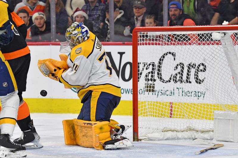 Dec 21, 2023; Philadelphia, Pennsylvania, USA; Nashville Predators goaltender Juuse Saros (74) makes a save against the Philadelphia Flyers during the second period at Wells Fargo Center. Mandatory Credit: Eric Hartline-USA TODAY Sports