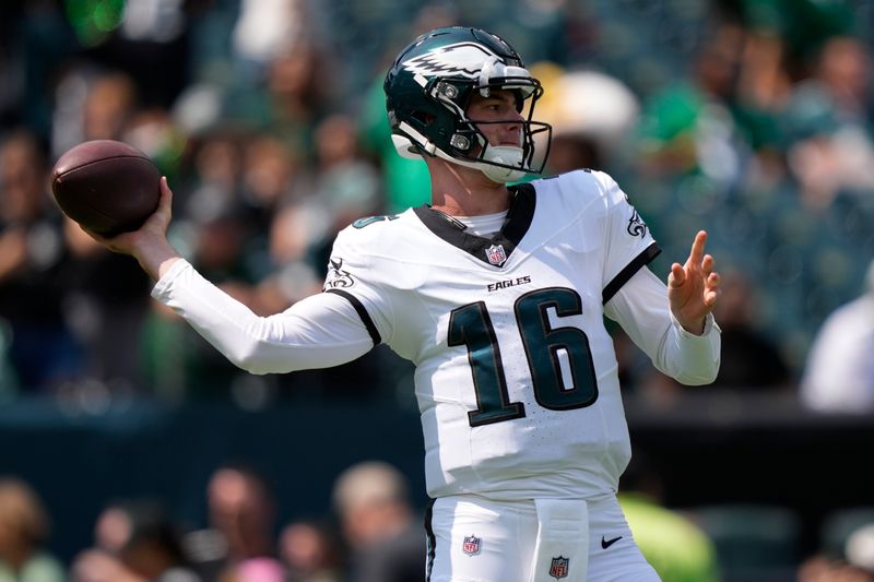 Philadelphia Eagles quarterback Tanner McKee (16) warms up before a preseason NFL football game against the Minnesota Vikings on Saturday, Aug. 24, 2024, in Philadelphia. (AP Photo/Matt Slocum)