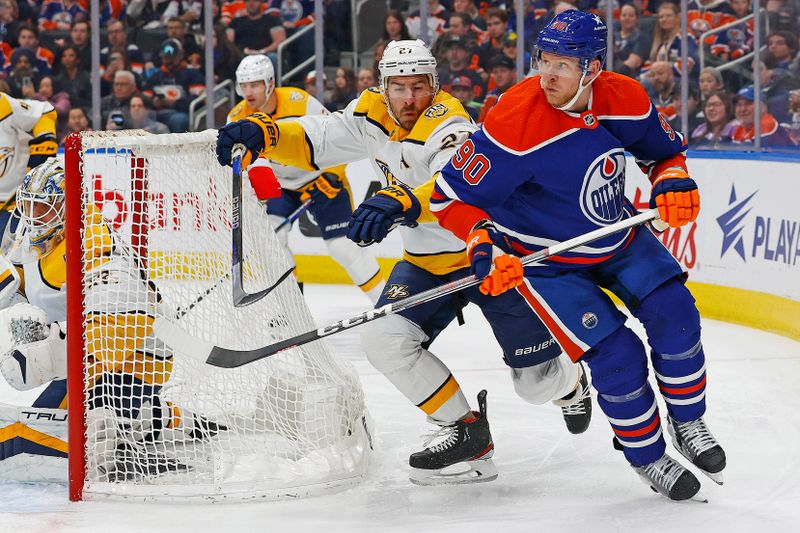 Jan 27, 2024; Edmonton, Alberta, CAN; Edmonton Oilers forward Corey Perry (90) and Nashville Predators defensemen Ryan McDonagh (27) battle for position during the first period at Rogers Place. Mandatory Credit: Perry Nelson-USA TODAY Sports