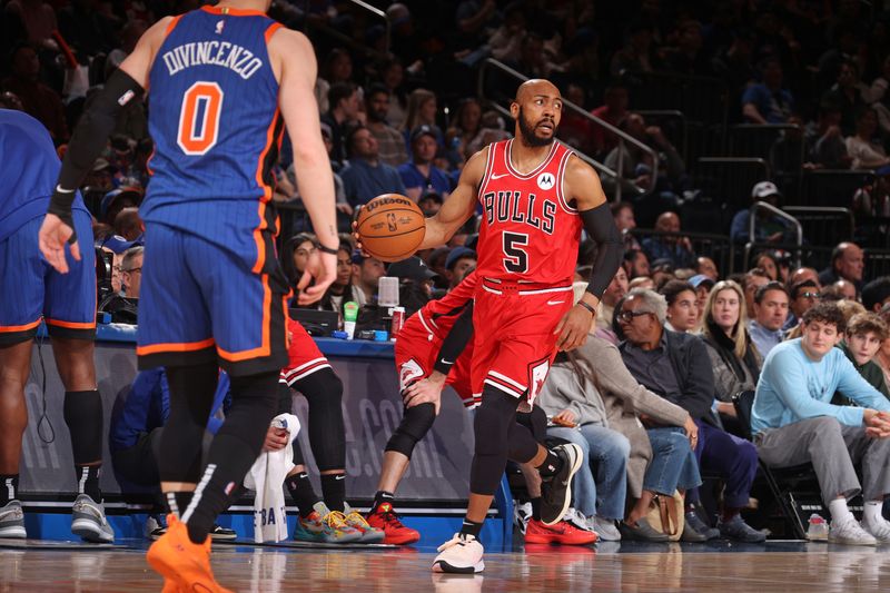 NEW YORK, NY - APRIL 14:  Jevon Carter #5 of the Chicago Bulls dribbles the ball during the game against the New York Knicks on April 14, 2024 at Madison Square Garden in New York City, New York.  NOTE TO USER: User expressly acknowledges and agrees that, by downloading and or using this photograph, User is consenting to the terms and conditions of the Getty Images License Agreement. Mandatory Copyright Notice: Copyright 2024 NBAE  (Photo by Nathaniel S. Butler/NBAE via Getty Images)