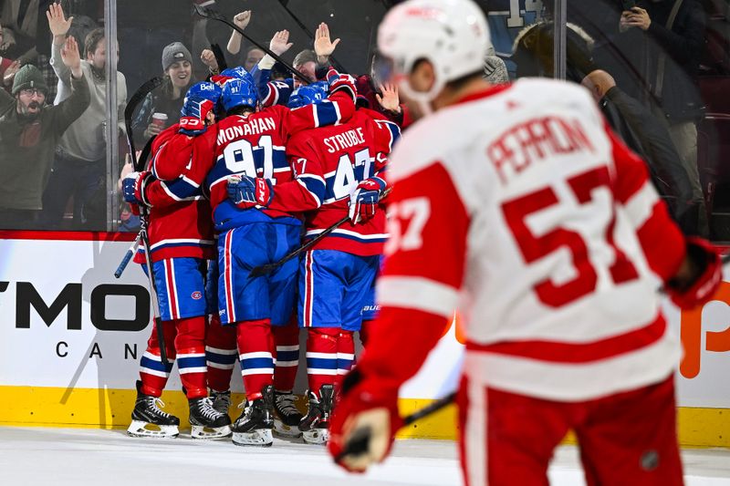 Dec 2, 2023; Montreal, Quebec, CAN; Montreal Canadiens defenseman Gustav Lindstrom (27) (not pictured) celebrates his goal against the Detroit Red Wings with his teammates during the third period at Bell Centre. Mandatory Credit: David Kirouac-USA TODAY Sports