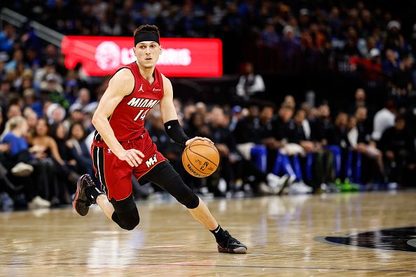 ORLANDO, FLORIDA - DECEMBER 20: Tyler Herro #14 of the Miami Heat dribbles the ball during the first half of a game against the Orlando Magic at Amway Center on December 20, 2023 in Orlando, Florida. NOTE TO USER: User expressly acknowledges and agrees that, by downloading and or using this photograph, User is consenting to the terms and conditions of the Getty Images License Agreement. (Photo by James Gilbert/Getty Images)